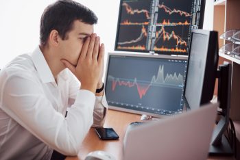 stockbroker-shirt-is-working-monitoring-room-with-display-screens-stock-exchange-trading-forex-finance-graphic-concept-businessmen-trading-stocks-online_compressed